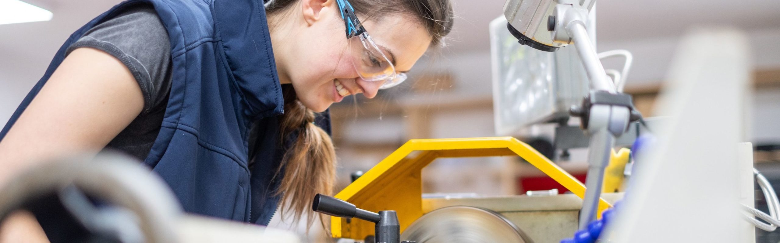 An Aqualife Team Member manufacturing a component on a Lathe